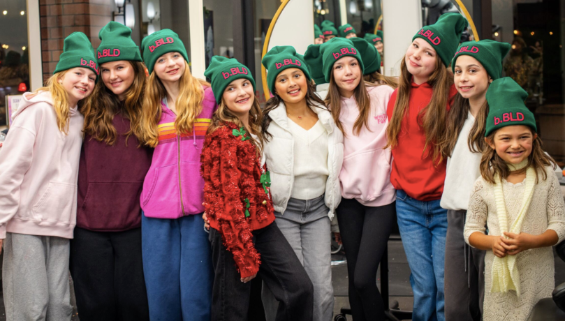 Girls smiling together wearing b.BLD